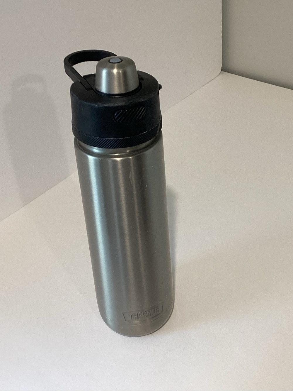 Thermos Stainless Steel Silver Water Bottle with Black Cap